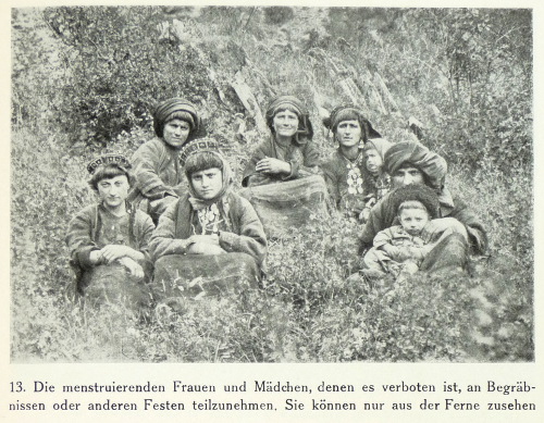 A group of menstruating women watching a funeral in Khevsureti in 1927